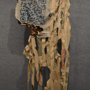 A tattered and singed representation of the U.S. flag with a QR code in the place of the stars.