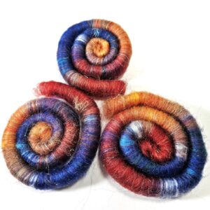 Textile art of 2oz hand-dyed, rolled wool.