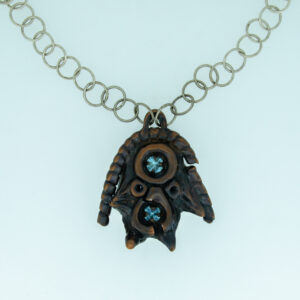 A copper and silver necklace.